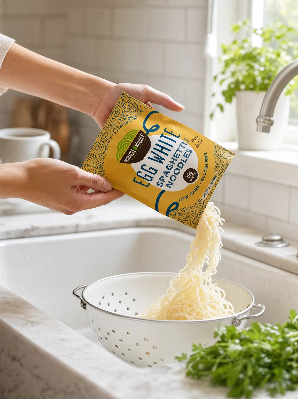 Rinsing noodles in a colander